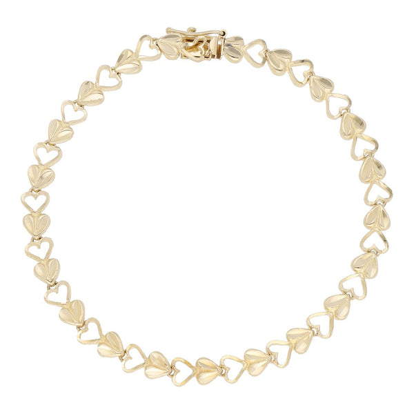 Pulsera eslabón encontrado motivo corazón en oro amarillo 14 kilates.