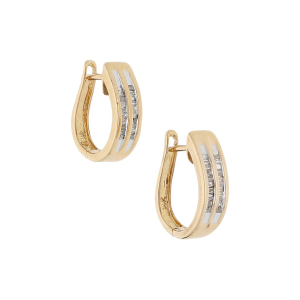 Arracadas articuladas con diamantes en oro amarillo 14 kilates.
