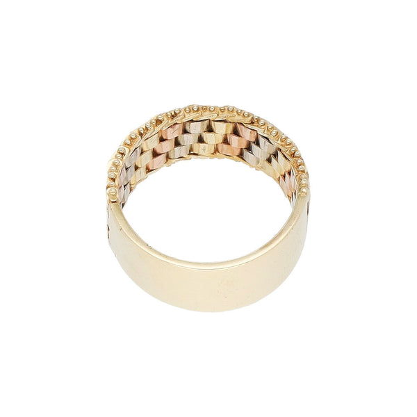 Anillo boleado en oro tres tonos 14 kilates.