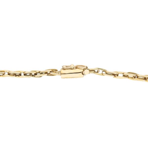 Pulsera eslabón tejido con aplicación motivo estrella en oro amarillo 14 kilates.
