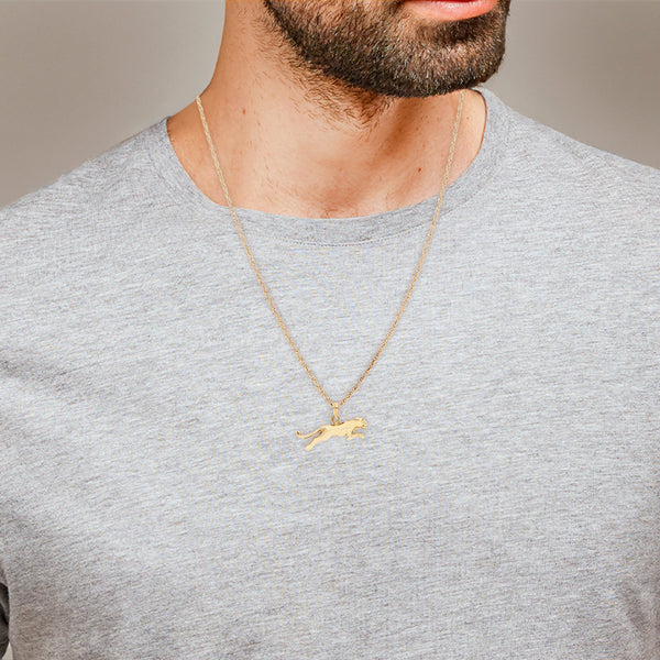 Collar eslabón torzal y dije liso motivo felino en oro amarillo 14 kilates.