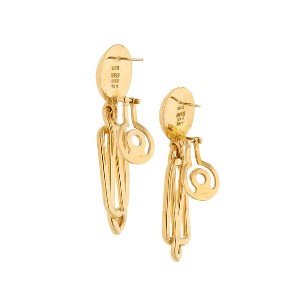 Aretes diseño especial firma Tane en oro amarillo 18 kilates.