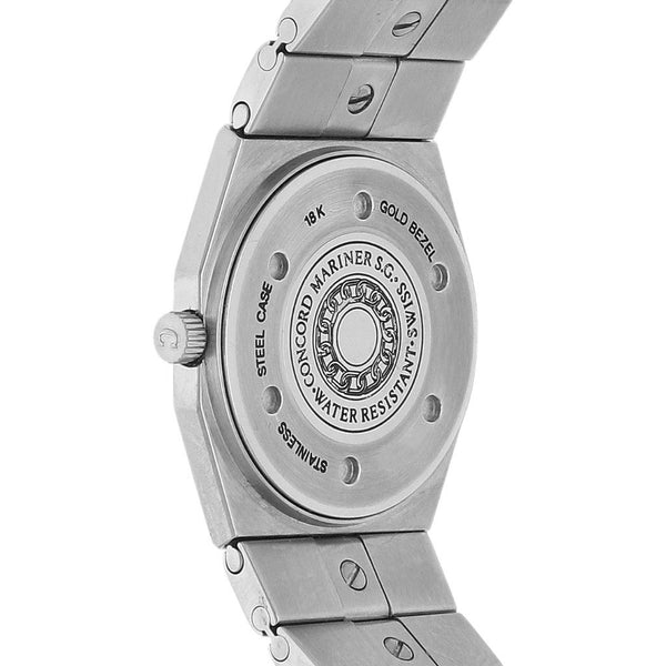 Reloj Concord para dama modelo Mariner bisel oro amarillo 18 kilates.