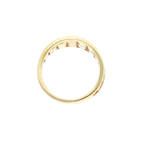 Anillo diseño especial en oro tres tonos 14 kilates.