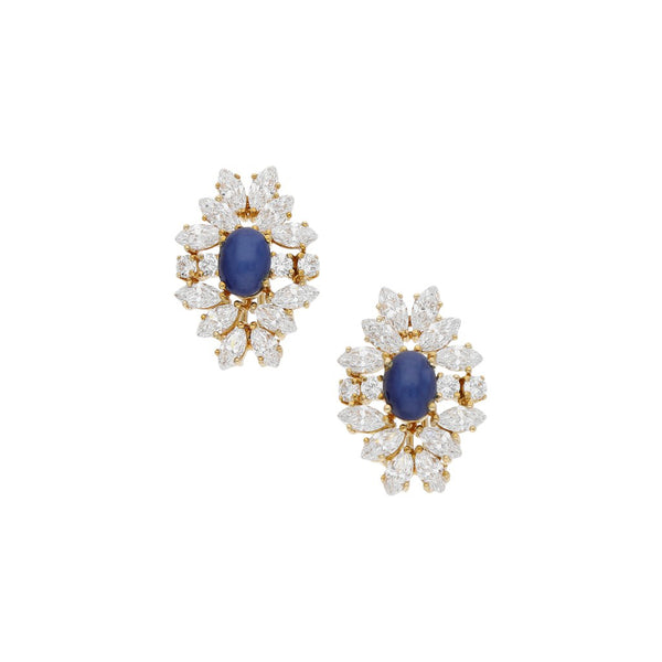 Aretes diseño especial con zafiro estrella y sintéticos en oro amarillo 14 kilates.