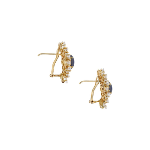 Aretes diseño especial con zafiro estrella y sintéticos en oro amarillo 14 kilates.