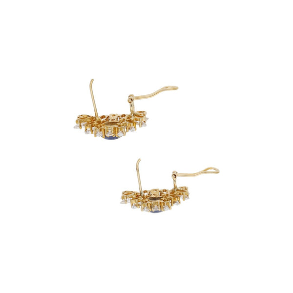 Aretes diseño especial con zafiro estrella y sintéticos en oro amarillo 14 kilates.