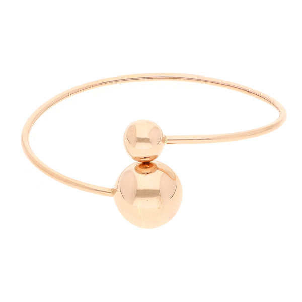 Pulsera de arillo rígida con aplicaciones en oro rosa 14 kilates.