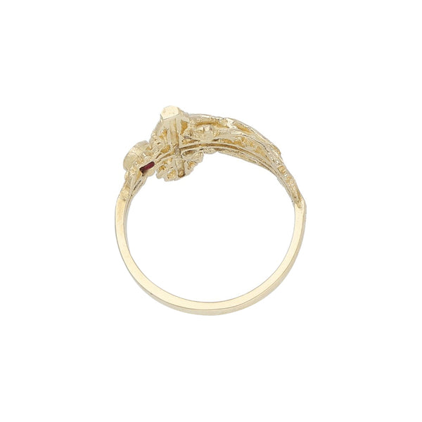 Anillo diseño especial motivo Cristo con gema en oro amarillo 14 kilates.