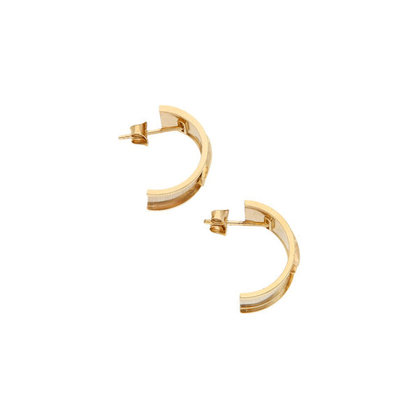 Broqueles diseño especial motivo delfín con circonias en oro amarillo 14 kilates.