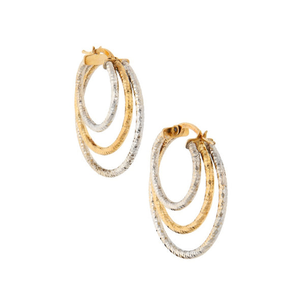 Arracadas diseño especial en oro dos tonos 14 kilates.