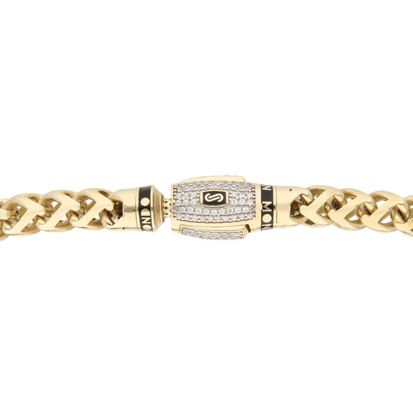 Pulsera calada con circonias en oro amarillo 14 kilates.