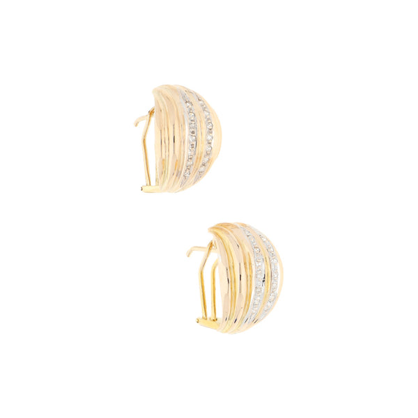 Aretes estilizados con diamantes en oro amarillo 12 kilates.
