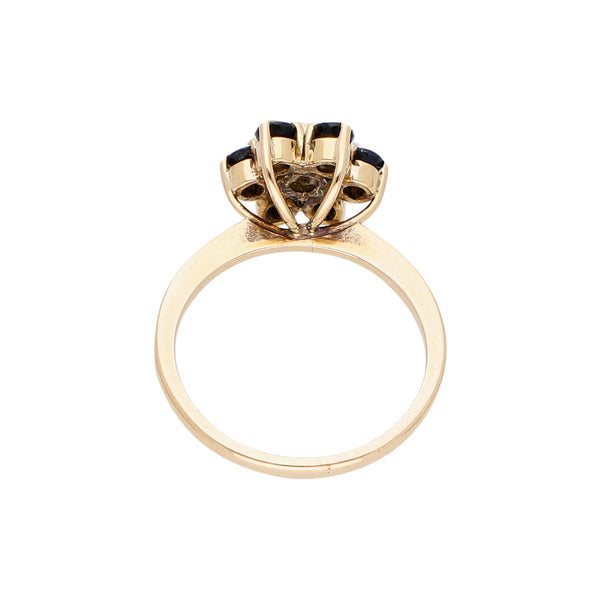 Anillo diseño especial con sintéticos en oro amarillo 12 kilates.