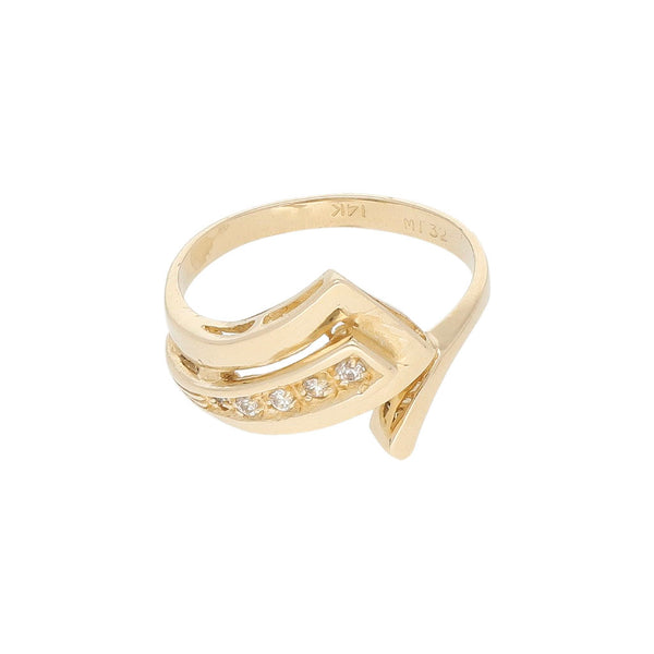 Anillo estilizado con circonias en oro amarillo 14 kilates.