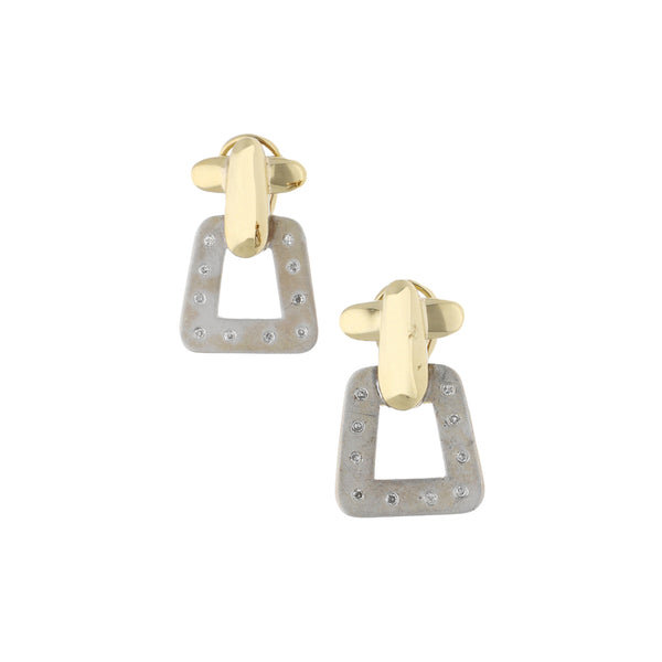 Aretes estilizados con diamantes en oro dos tonos 14 kilates.