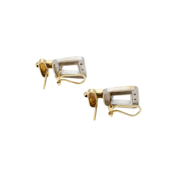 Aretes estilizados con diamantes en oro dos tonos 14 kilates.