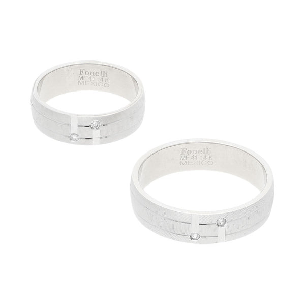 Dos argollas lisas con circonias en oro blanco 14 kilates.
