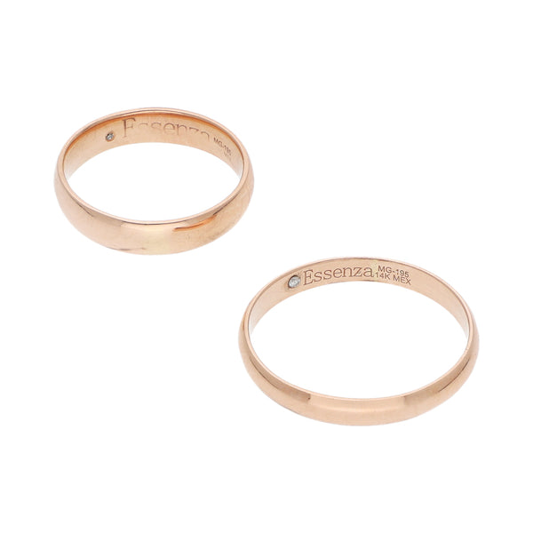Dos argollas lisas con diamantes en oro rosa 14 kilates.