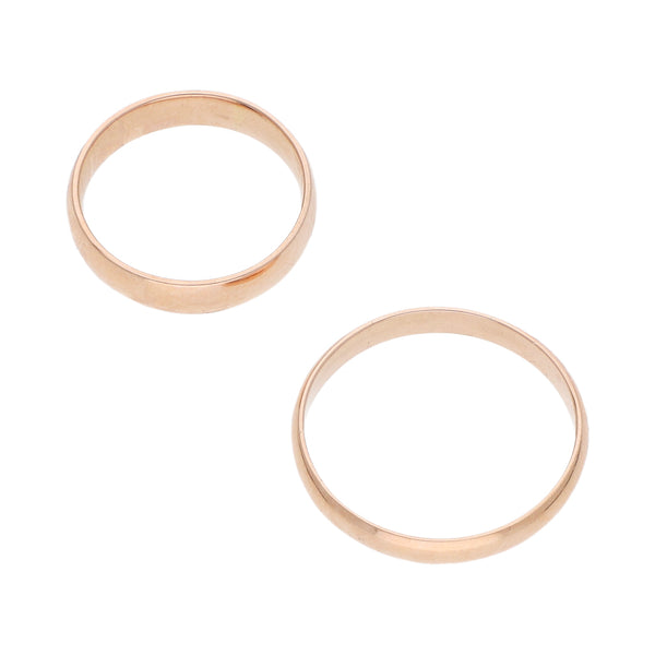 Dos argollas lisas con diamantes en oro rosa 14 kilates.