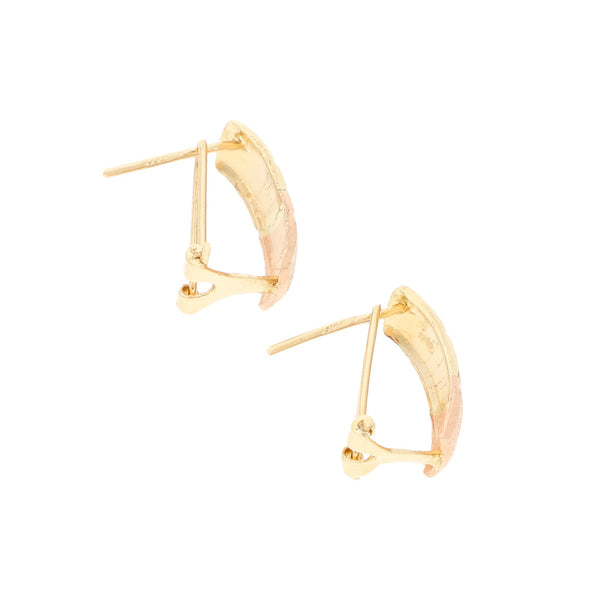 Aretes labrados en oro dos tonos 14 kilates.