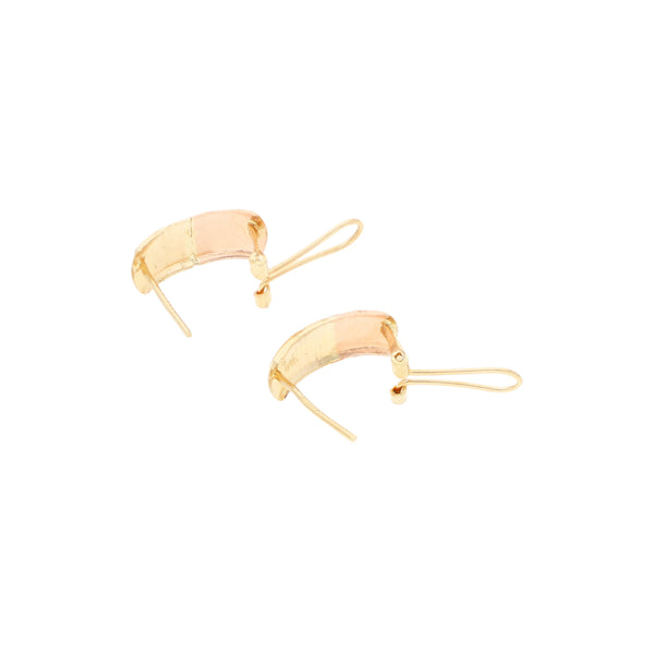 Aretes labrados en oro dos tonos 14 kilates.