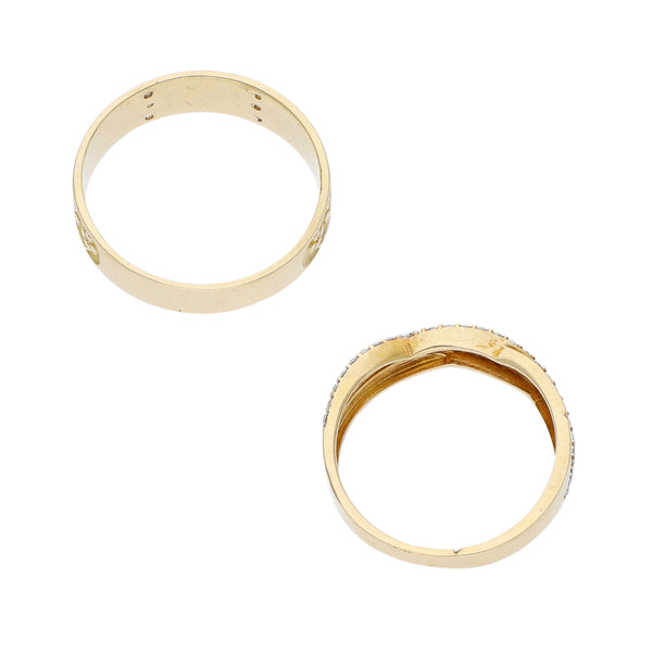 Dos anillos diseño especial con circonias en oro amarillo 14 kilates.