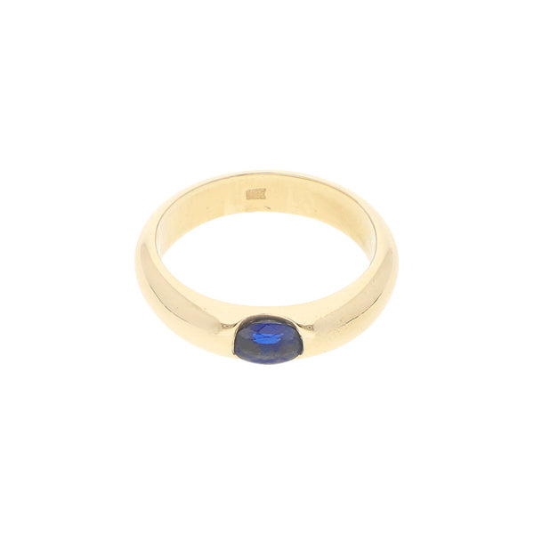 Anillo liso con zafiro en oro amarillo 14 kilates.