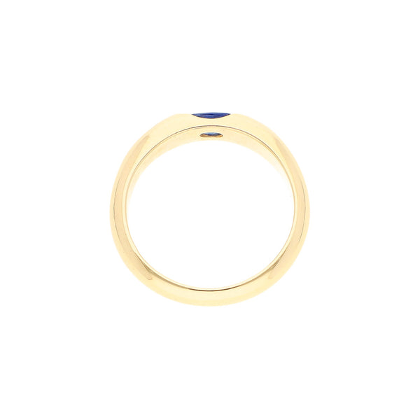 Anillo liso con zafiro en oro amarillo 14 kilates.