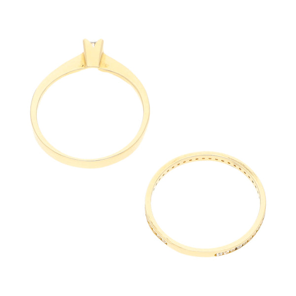 Anillo de compromiso y churumbela lisa con circonias en oro amarillo 14 kilates.