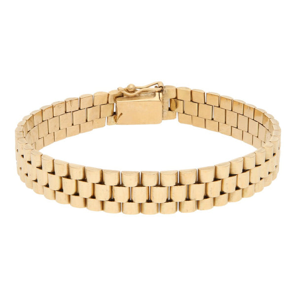 Pulsera eslabón articulado con aplicación motivo corona en oro amarillo 14 kilates