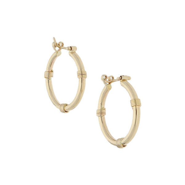 Arracadas huecas en oro amarillo 14 kilates.