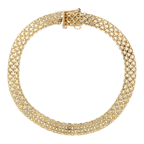 Pulsera eslabón tejido en oro amarillo 14 kilates.