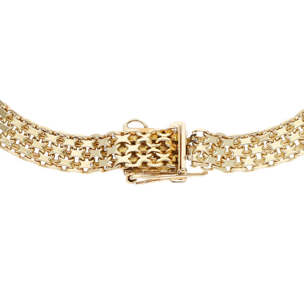 Pulsera eslabón tejido en oro amarillo 14 kilates.