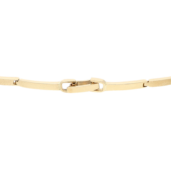 Pulsera eslabón articulado con circonias en oro tres tonos 14 kilates.