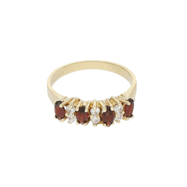 Anillo diseño especial con sintéticos en oro amarillo 14 kilates.