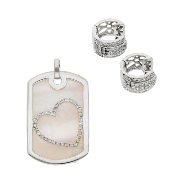 Juego de arracadas articuladas y dije calado con madre perla y diamantes en oro blanco 14 kilates.