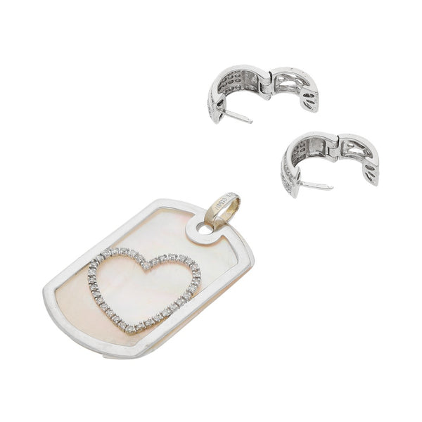 Juego de arracadas articuladas y dije calado con madre perla y diamantes en oro blanco 14 kilates.