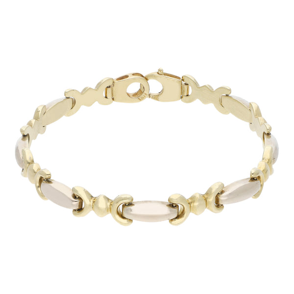 Pulsera eslabón articulado en oro dos tonos 14 kilates.