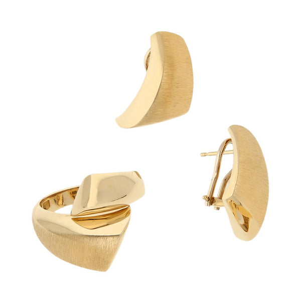 Juego de anillo y aretes estilizados en oro amarillo 14 kilates.