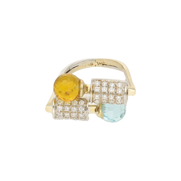 Anillo diseño especial con sintéticos en oro dos tonos 14 kilates.