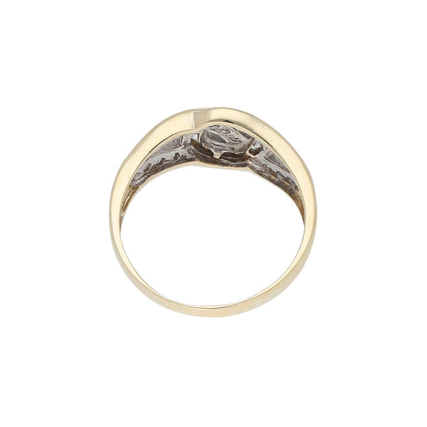 Anillo calado con circonias en oro amarillo 14 kilates.