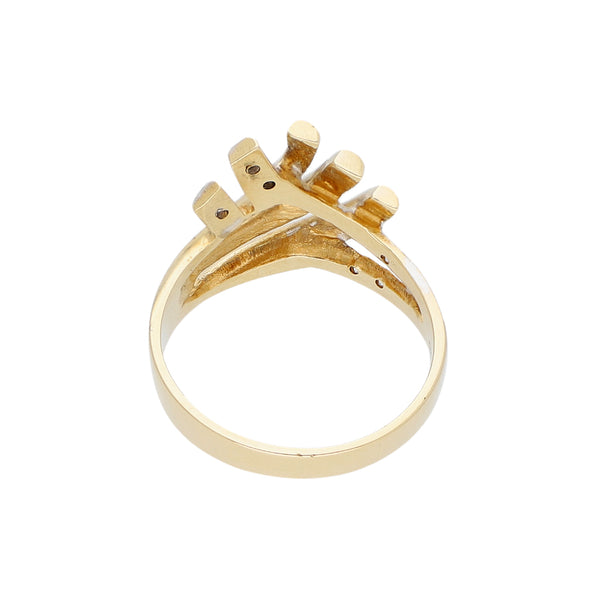 Anillo calado con diamantes en oro amarillo 14 kilates.