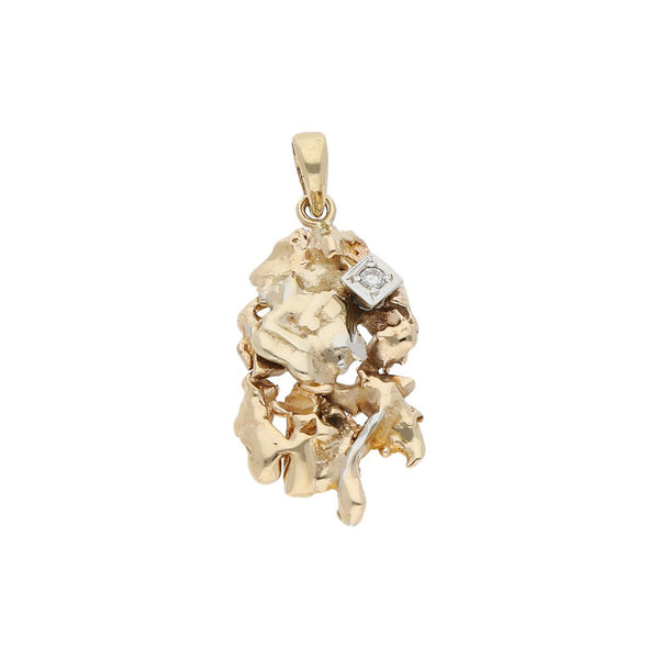 Dije diseño barroco con diamante en oro dos tonos 14 kilates.
