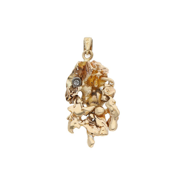 Dije diseño barroco con diamante en oro dos tonos 14 kilates.