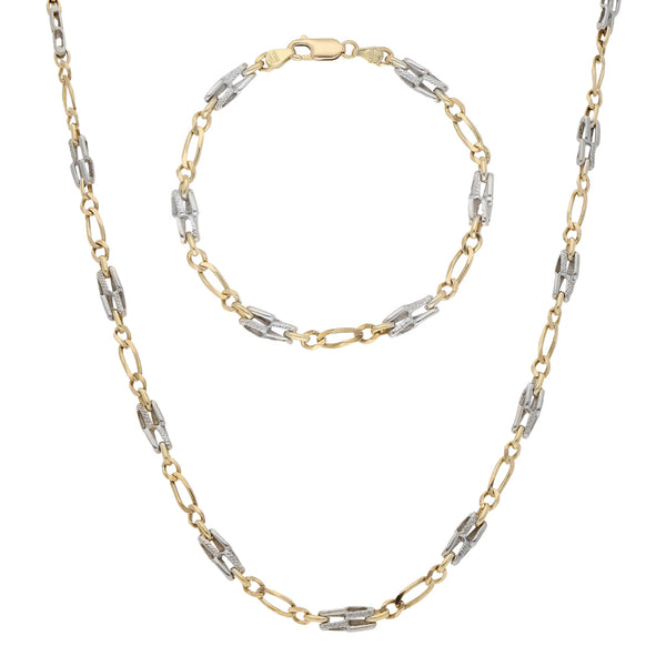 Juego de collar y pulsera eslabón combinado en oro dos tonos 14 kilates.