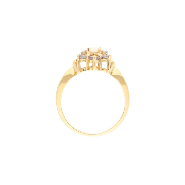 Anillo calado con diamantes, ópalo y sintéticos en oro amarillo 14 kilates.