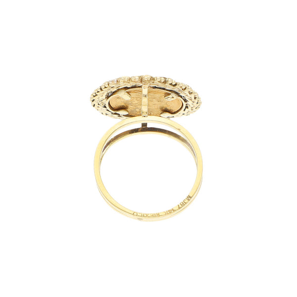 Anillo boleado con moneda de dos pesos oro mexicano 21.6 kilates en oro amarillo 14 kilates.