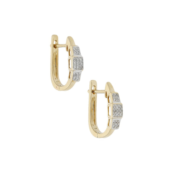 Aretes diseño especial con diamantes en oro amarillo 14 kilates.
