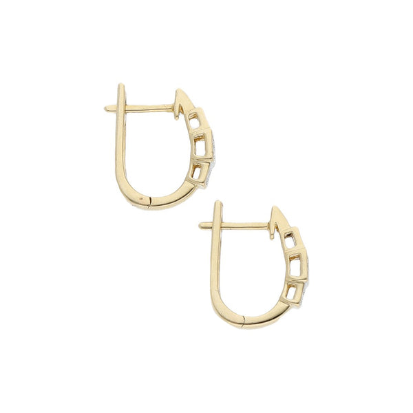 Aretes diseño especial con diamantes en oro amarillo 14 kilates.